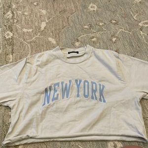 brandy melville white and blue new york shirt